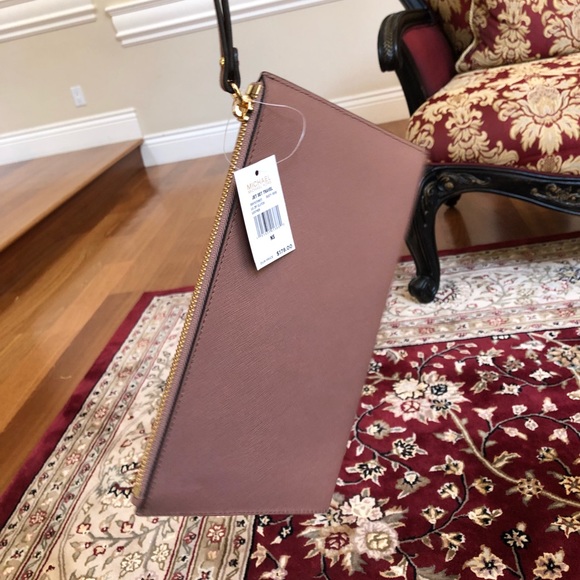 Authentic Michael Kors perforated clutch wristlet - Picture 7 of 8